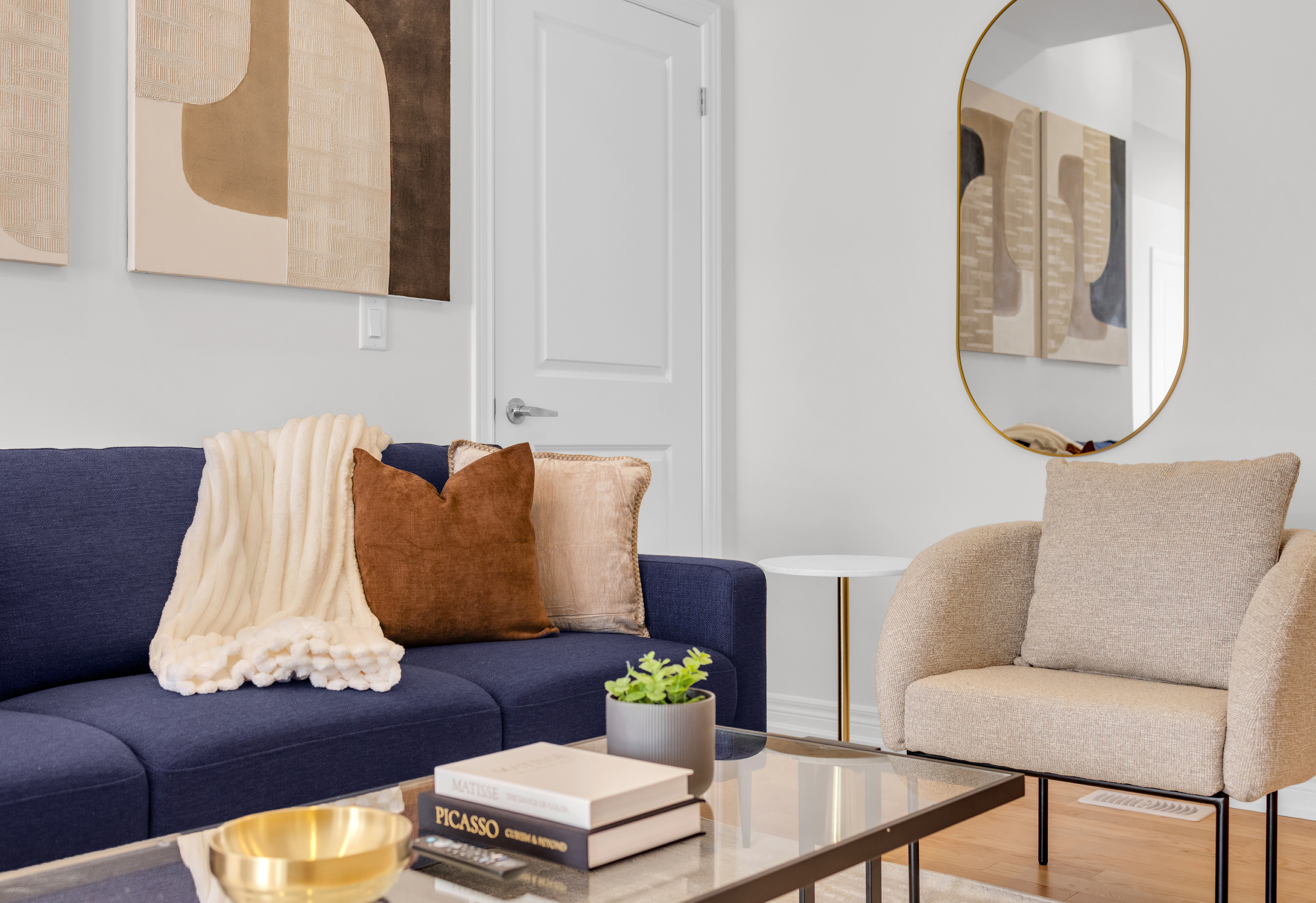 Styled living room designed by LikeHouse Properties for a rental listing