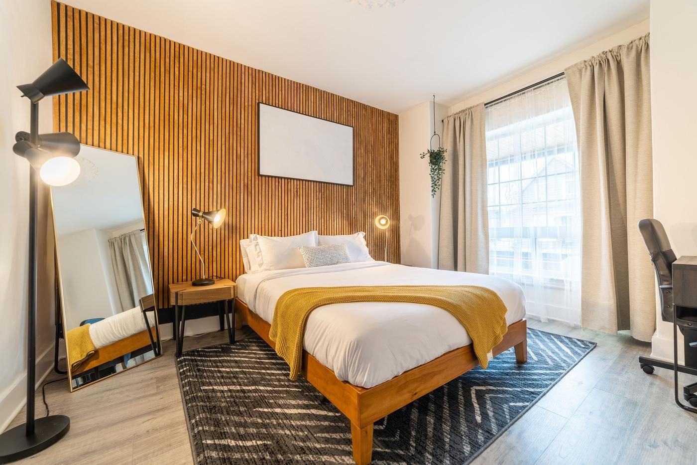 Furnished bedroom in a managed rental property